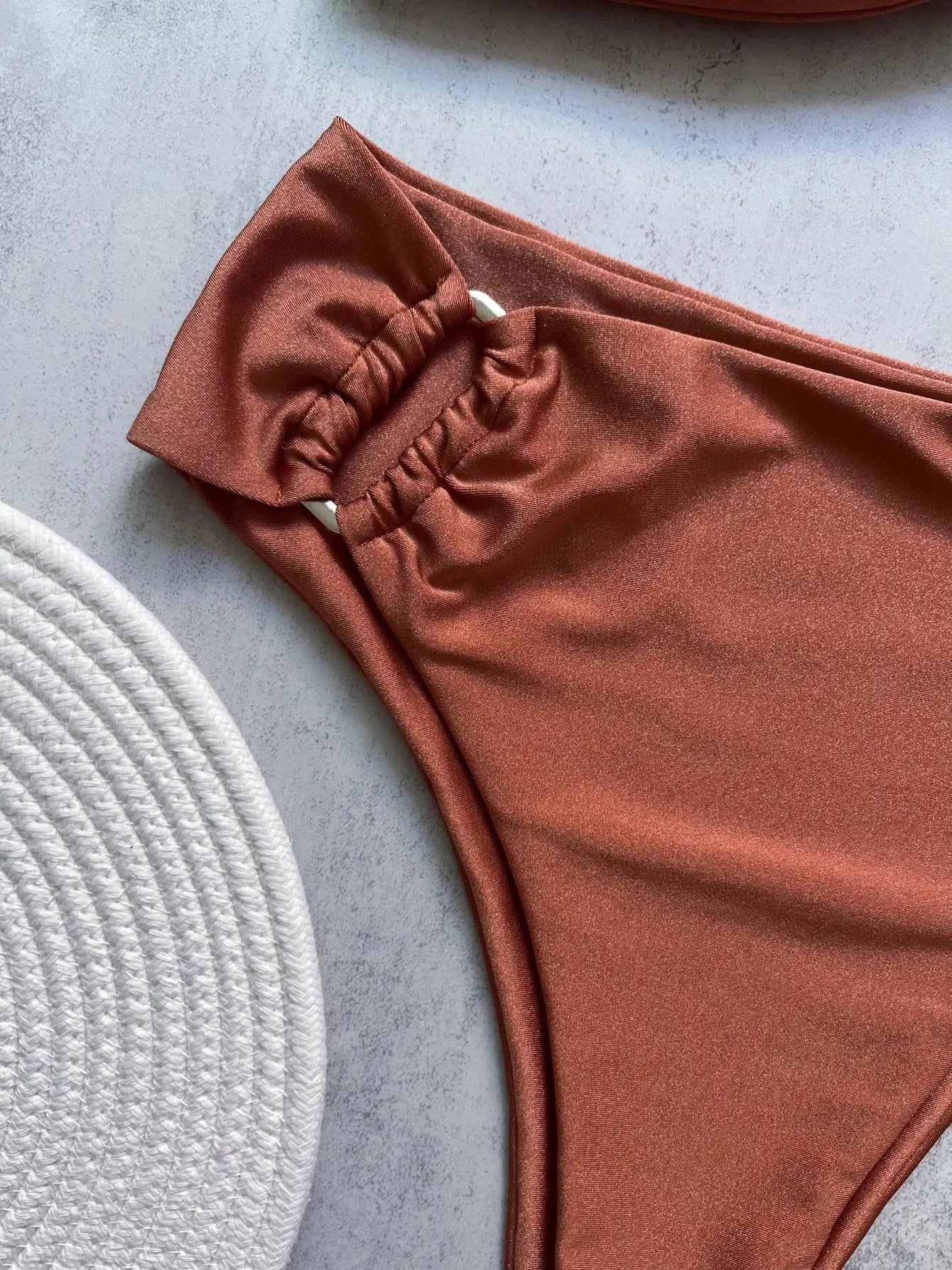 Bandeau bikini top in rust-orange with ruched elastic band detail