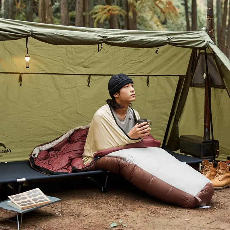 Naturehike sleeping bag liner, ultralight mummy-style, brown and white, portable camping sheet inside a tent