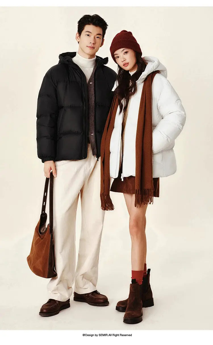 Semir down jackets; black hooded men's puffer and white hooded women's puffer.