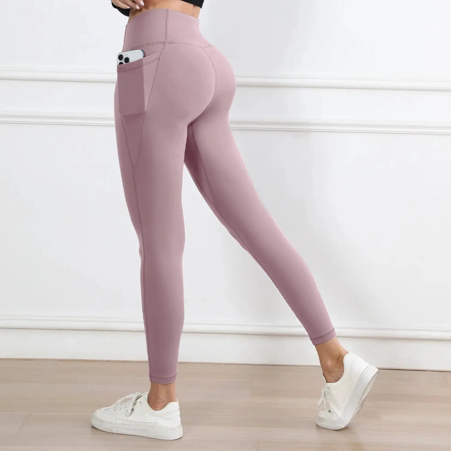 Women's mauve high-waisted leggings with a side pocket, butt-lifting workout tights for casual wear