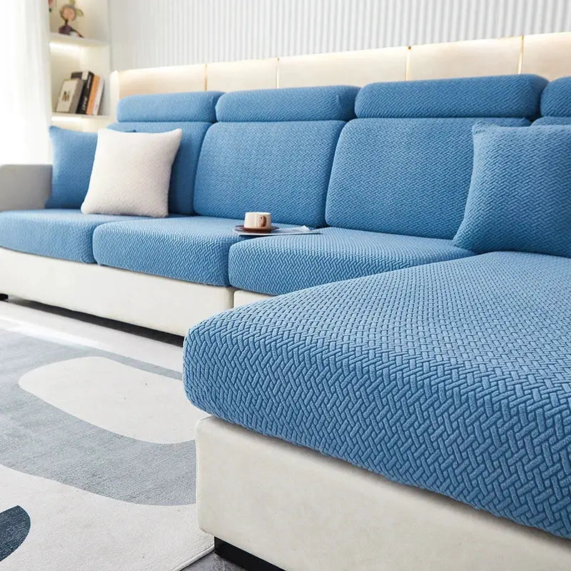 Blue jacquard sofa seat cushion cover by Simples Market; stretchable, adjustable furniture protector.