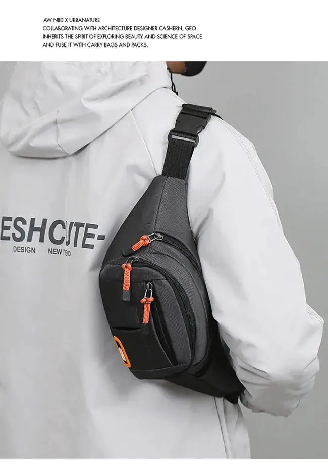 Oxford waterproof waist bag, black fanny pack with orange zipper pulls.