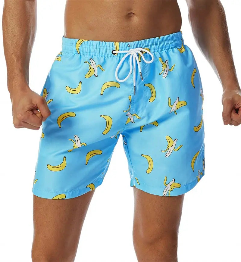 Men's blue banana-print swim shorts with white drawstring, Simples Market Hawaii beach trunks