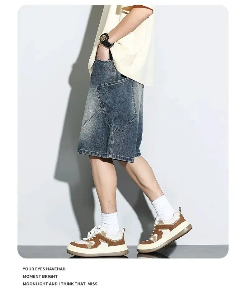 Baggy denim shorts in vintage washed blue, knee-length straight fit with patch pockets