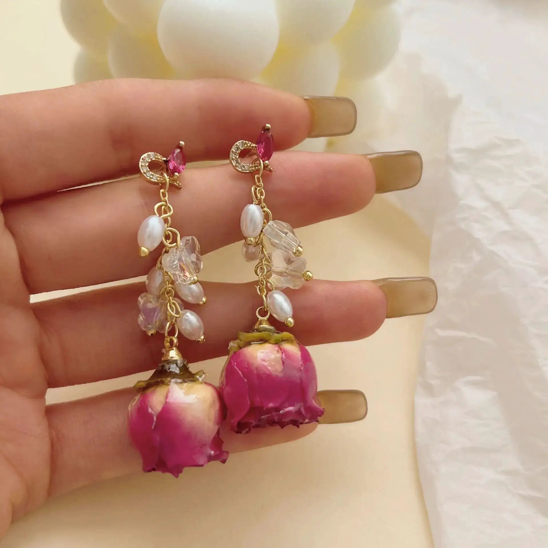Red rose drop earrings by Simples Market with gold-tone chain, pink marquise crystal and pearl beads