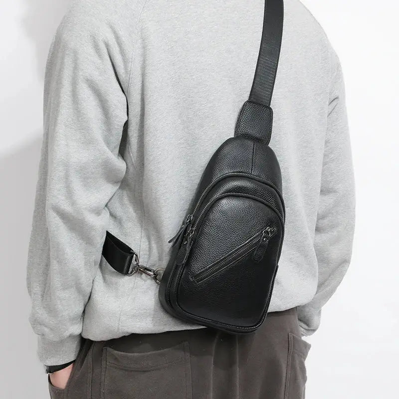 Men's chest bag by Simples Market, black genuine leather crossbody sling with zip pockets