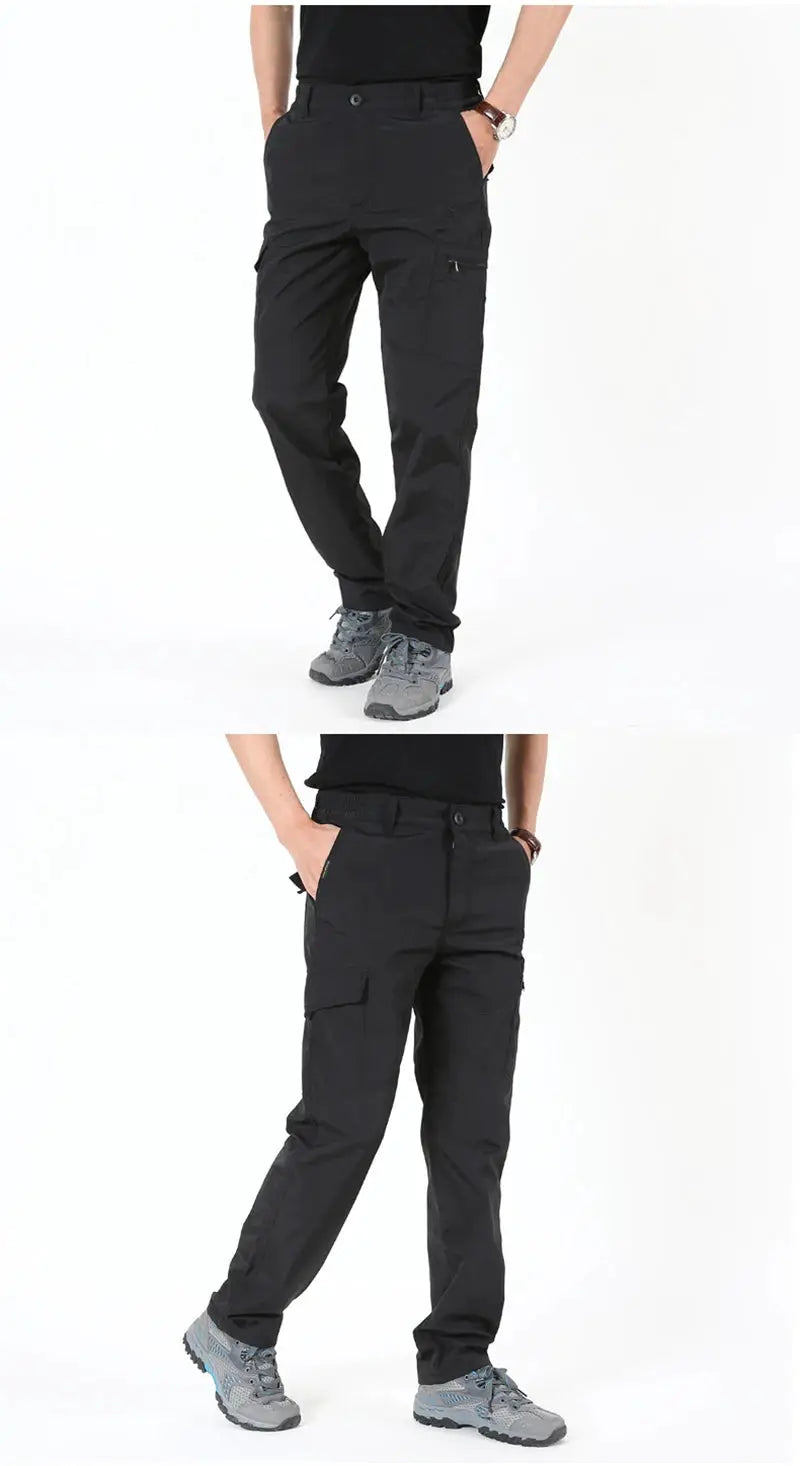 Men's black outdoor work cargo pants with multiple pockets, waterproof fleece-lined for hiking.