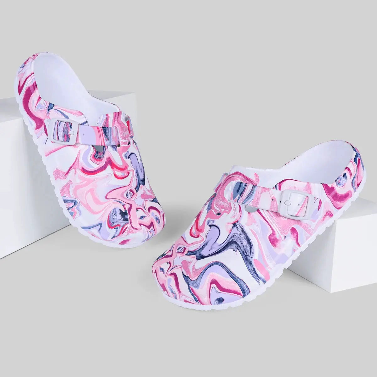 Women's marble-pink EVA garden clogs with adjustable strap, two shoes shown.