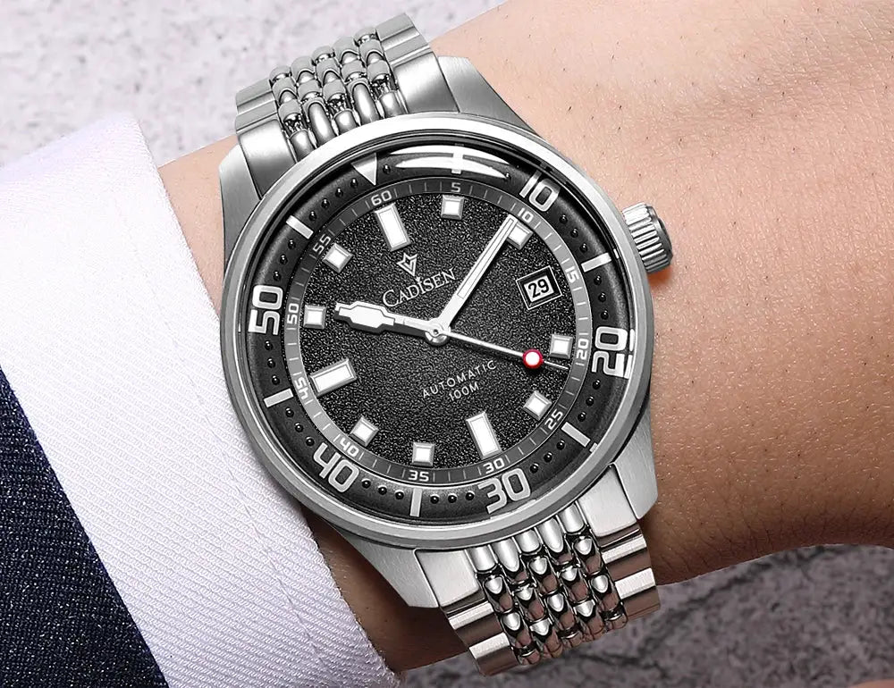 CADISEN men's automatic mechanical watch with a silver stainless steel bracelet and a black textured dial