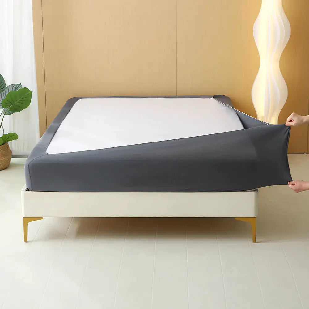 Stretchable bed skirt with gray sides and white top panel, non-slip design