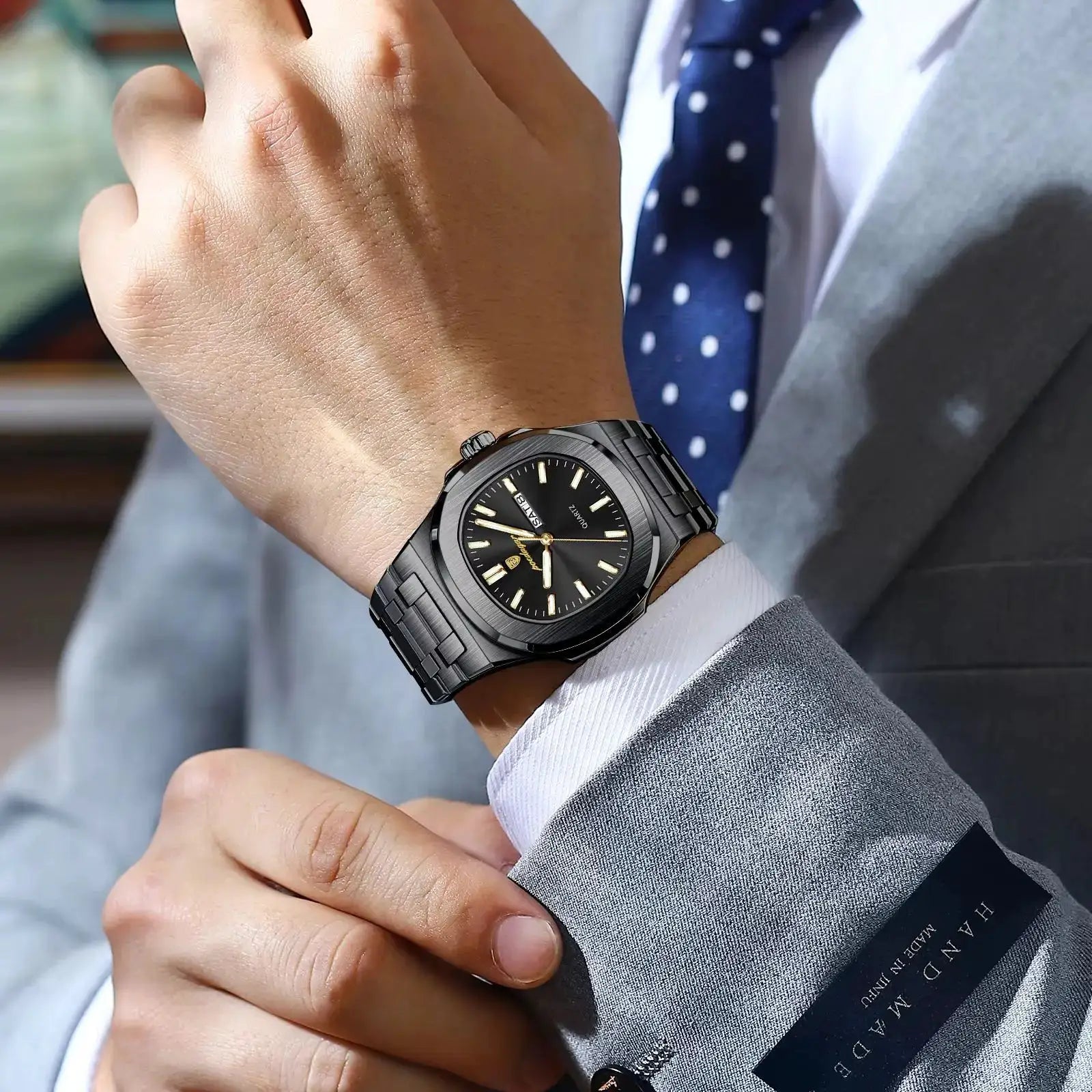 POEDAGAR square men's stainless steel watch with black dial, gold-tone hands, luminous markers, metal bracelet