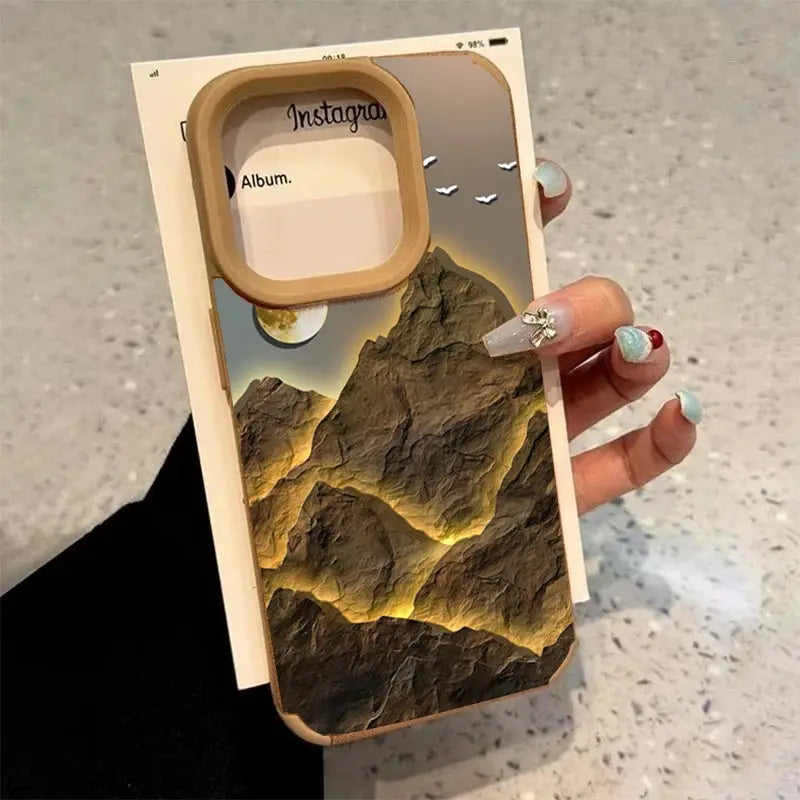 iPhone case by Simples Market with faux leather and mountain lake scenery motif, tan border, square camera cutout.