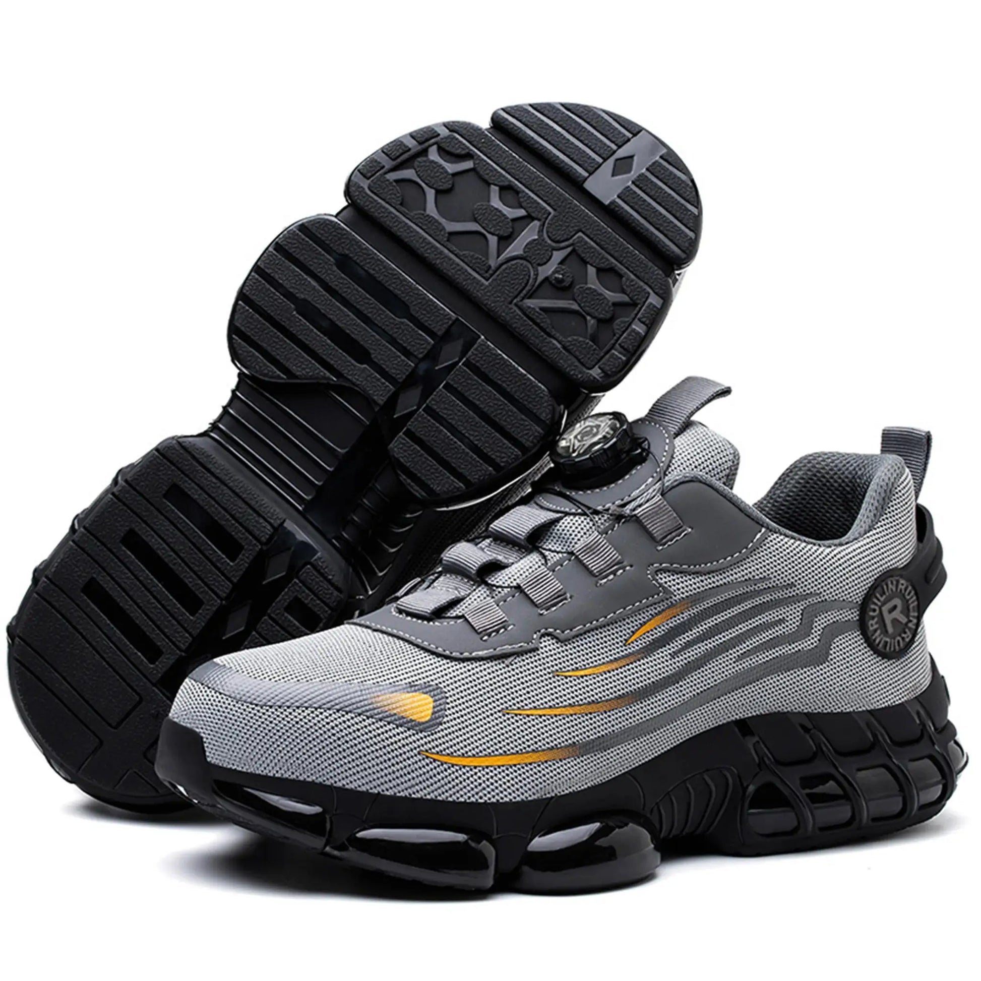 Steel-toe safety shoes in black and gray with slip-resistant, rugged outsole