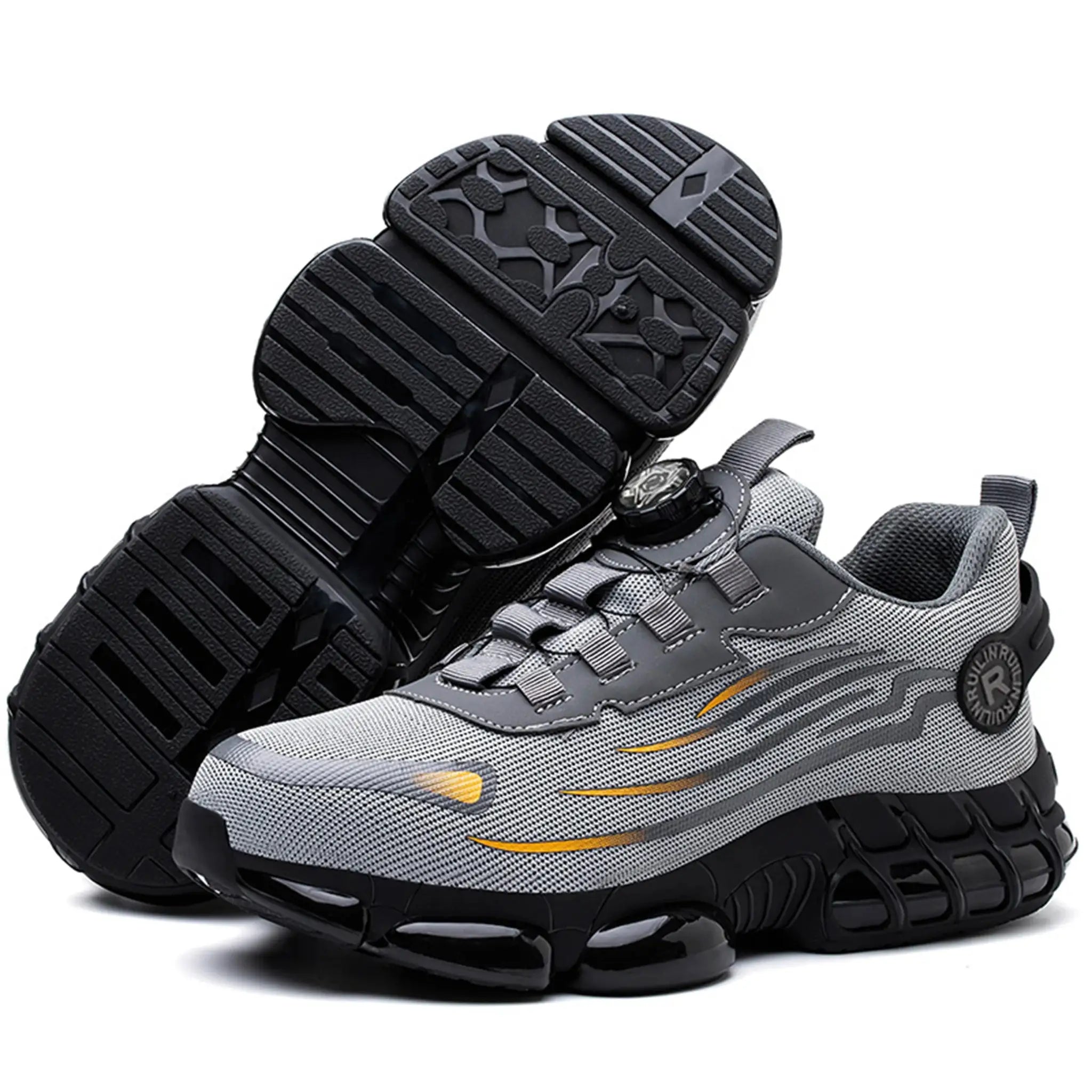 Steel-toe safety shoes in black and gray with slip-resistant, rugged outsole