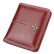 Women's red oil-waxed PU wallet with zipper, white stitching and gold cross emblem