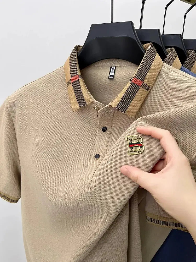 Beige men's polo shirt with Burberry-style check collar and gold B crest logo, silk-cotton, short sleeves