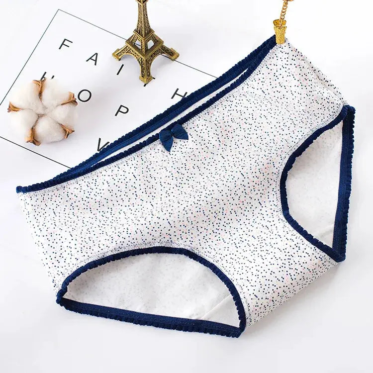 1pc women's cotton seamless panties with navy trim and a small bow, white speckle print.