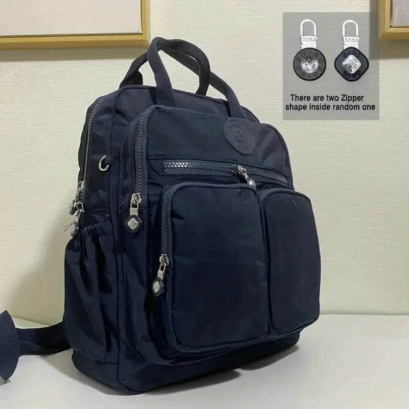 Simples Market Fashion Woman Backpack, navy waterproof nylon with multiple zip pockets and soft top handles