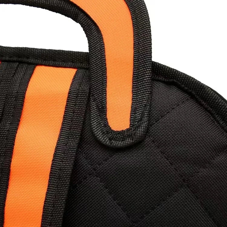 Backpack by Simples Market for children, black quilted fabric with orange padded straps