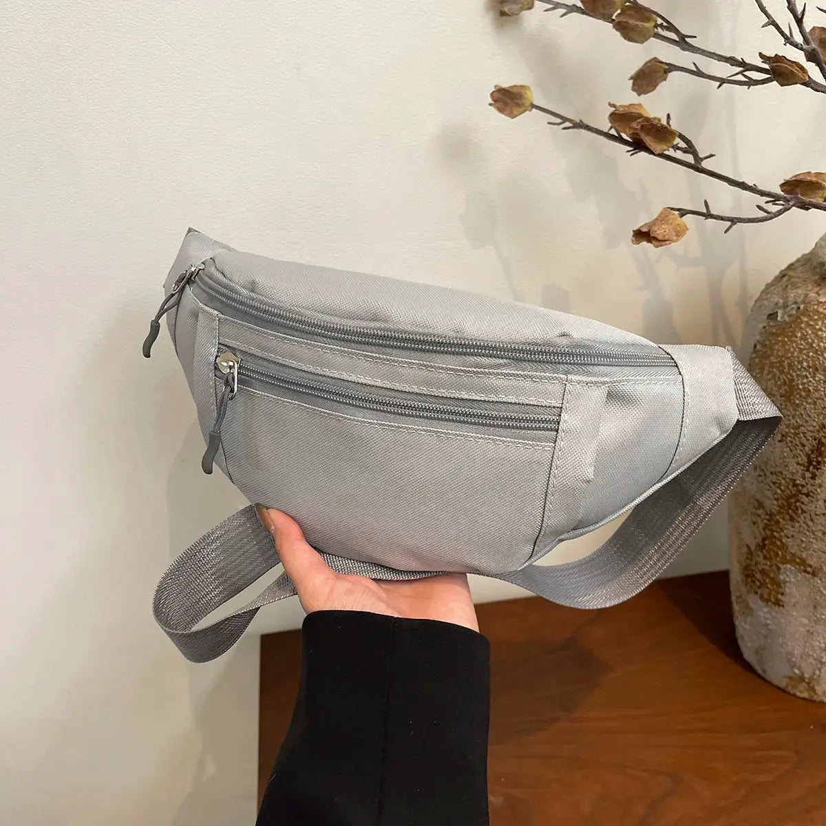 Fanny pack Simples Market gray nylon waist bag with dual zipper pockets and adjustable strap.