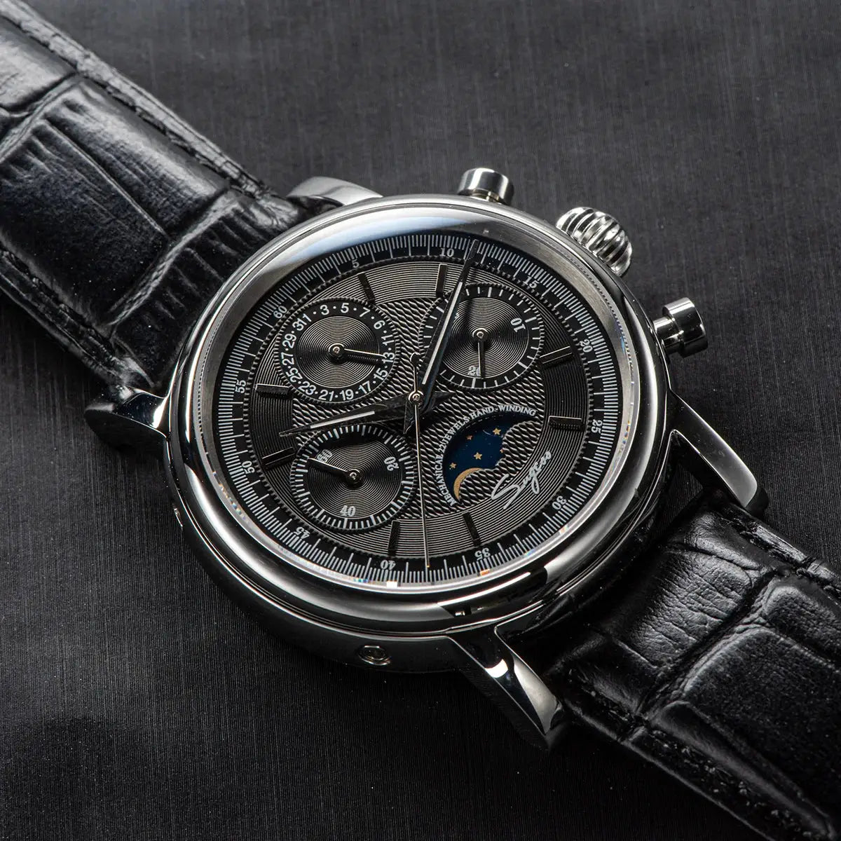Sugess ST1908 men's watch; mechanical chronograph with moonphase, black dial, leather strap