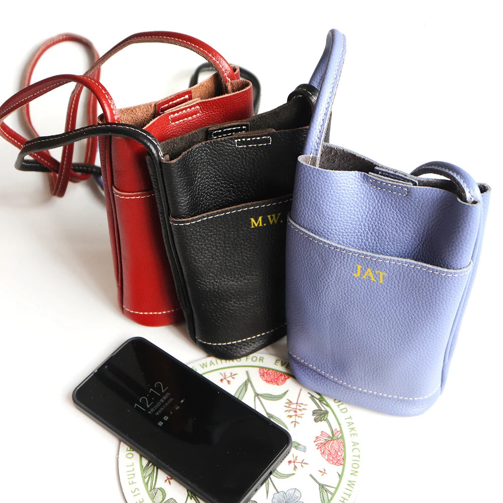 Personalized genuine leather card holder set with four mini envelope sleeves in red, black, and lavender