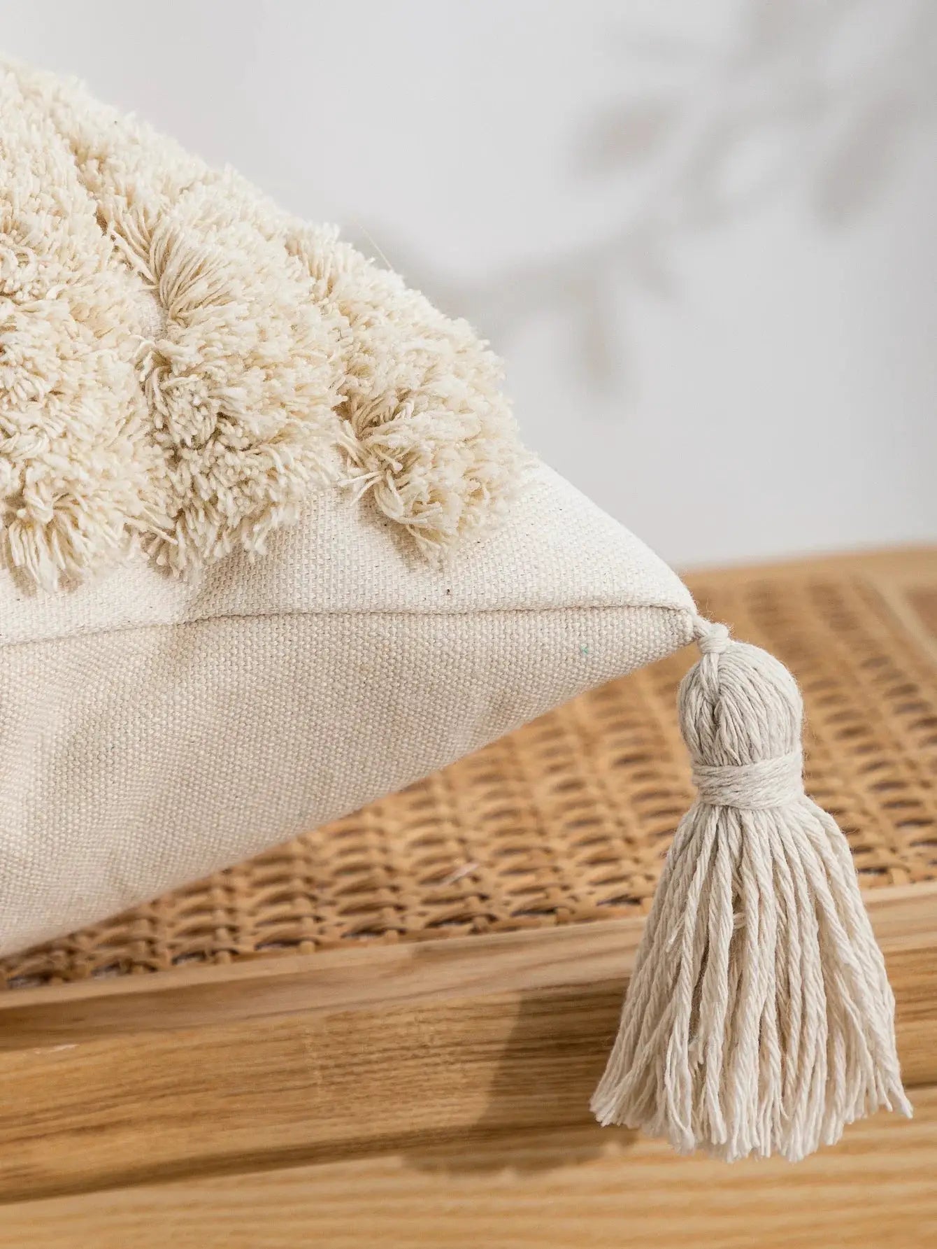 Beige pillowcase with plush tufted edge and tassel fringe for boho decor