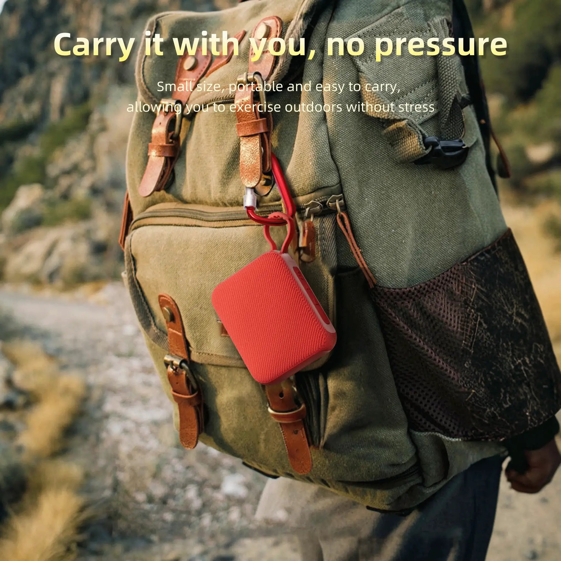 Simples Market G04 portable red Bluetooth speaker attached to a hiking backpack outdoors.