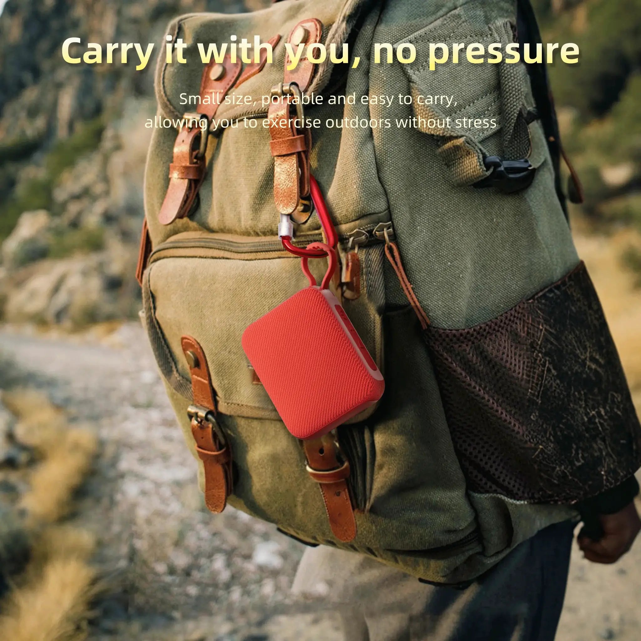 Simples Market G04 portable red Bluetooth speaker attached to a hiking backpack outdoors.