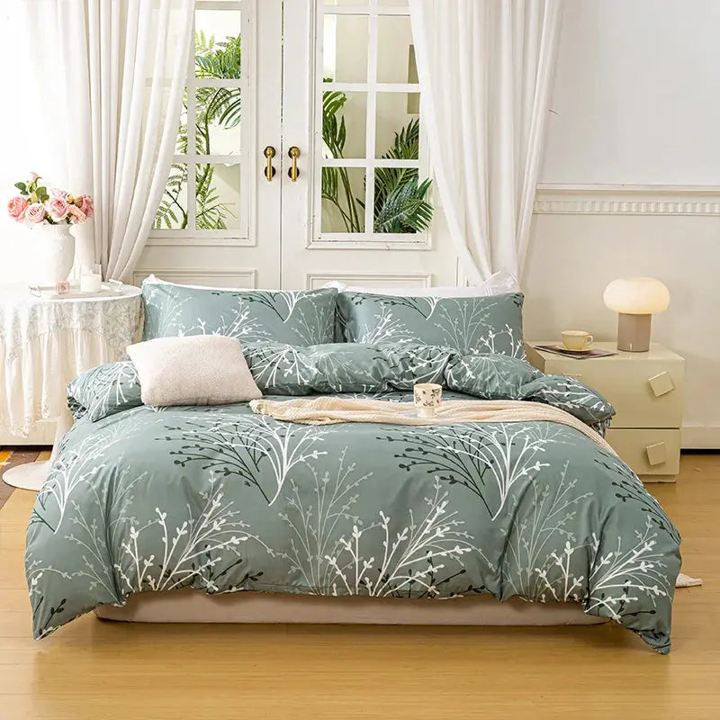 Simples Market 3-piece leaf floral duvet cover set in teal; includes 1 duvet cover and 2 pillowcases.
