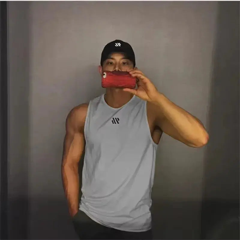 Men's light gray sleeveless gym tank top stringer by Simples Market with chest logo