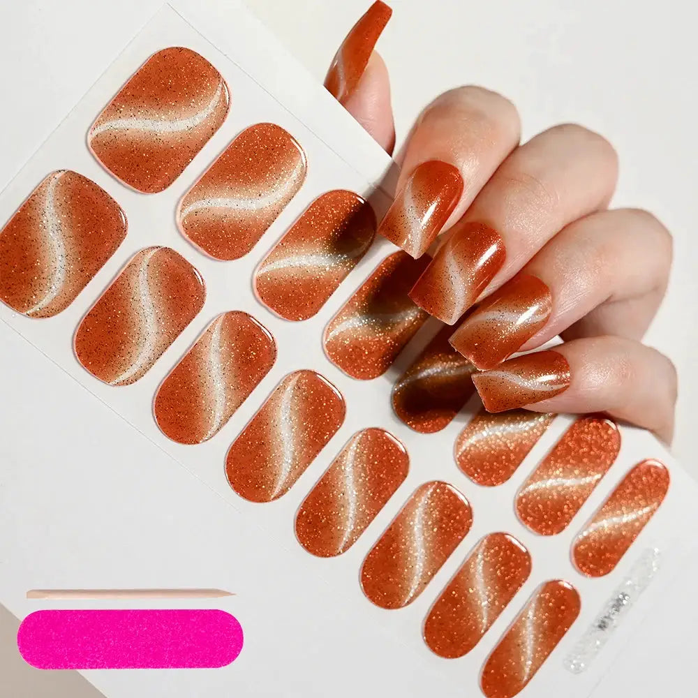 Semi-cured gel nail wraps sheet in copper-orange glitter with white swirl, full-cover decals by Simples Market