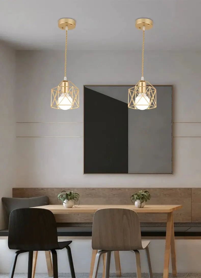 Modern LED pendant lights with gold iron finish and geometric metal cages; two hanging fixtures.