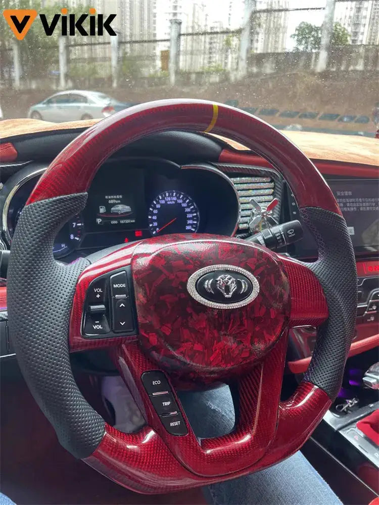 Car steering wheel wrap in red forged carbon fiber vinyl with VIKIK branding