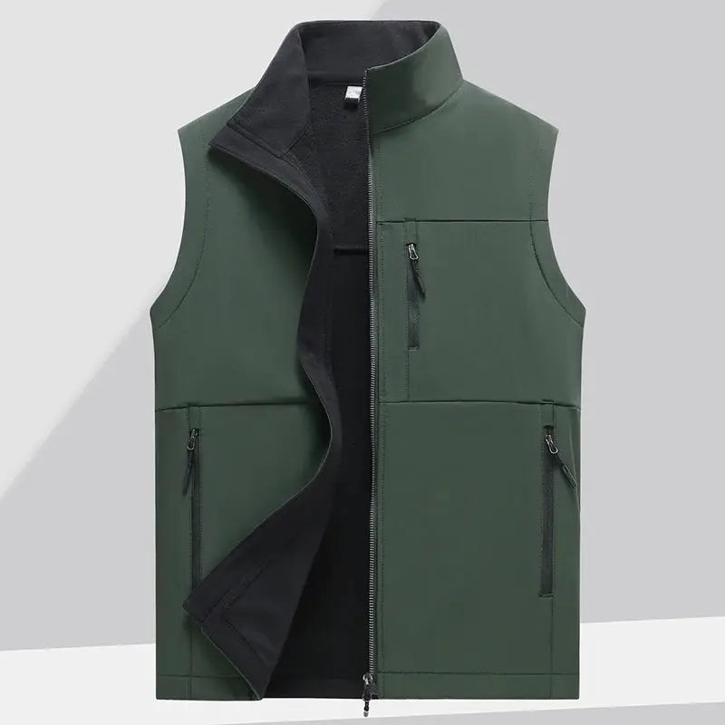 Soft shell vest by Simples Market; men's green, sleeveless with zip front, fleece-lined interior, multiple pockets.