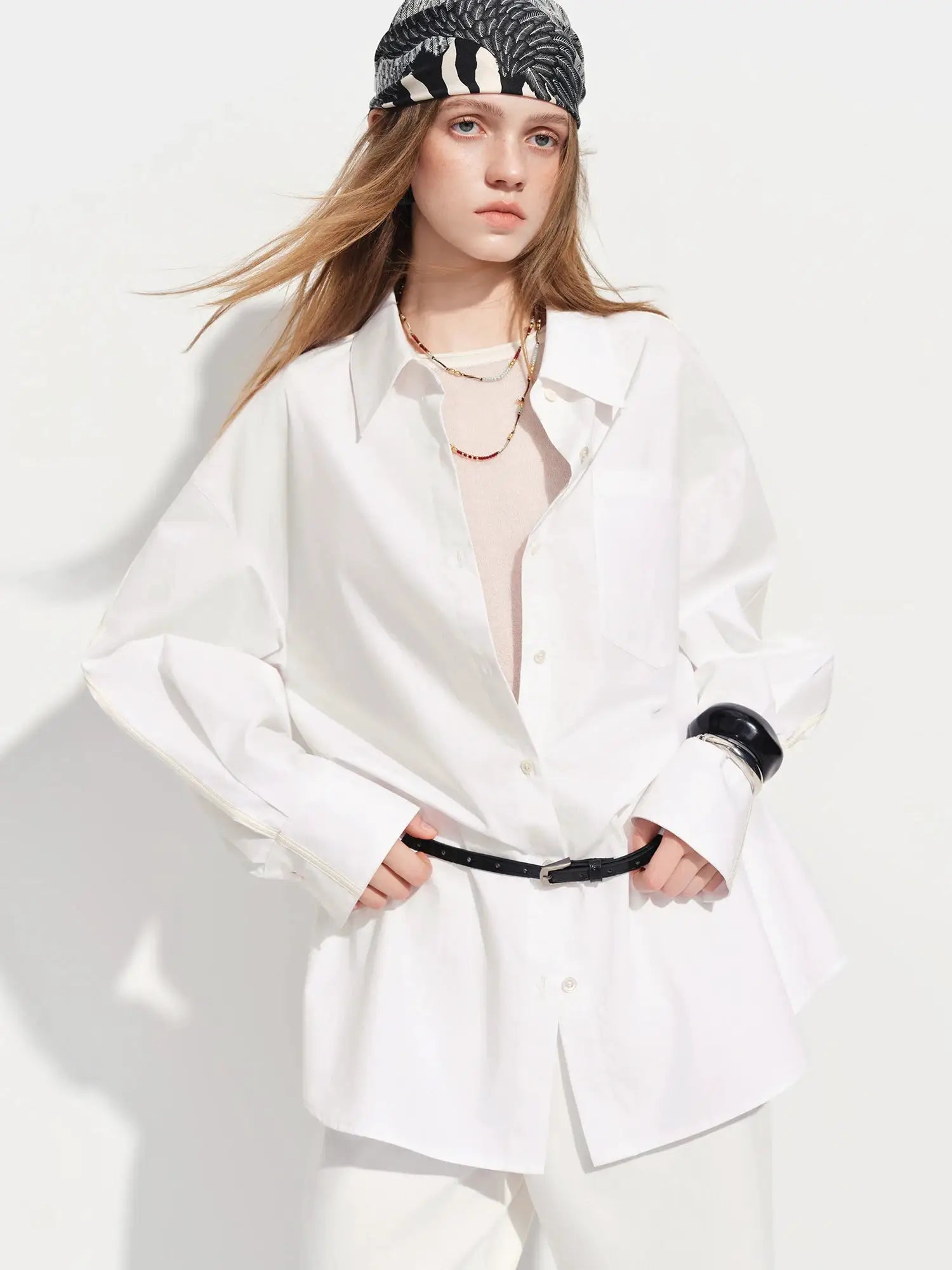 FSLE Premium Series women's loose-fit white cotton shirt with long sleeves and web-strap detail Simples Market