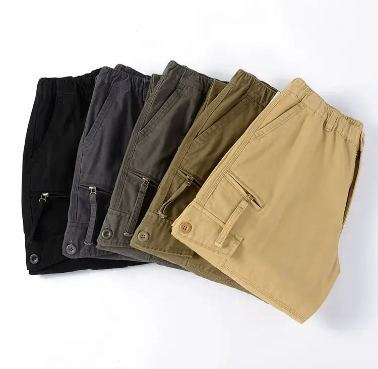 Five-pack of men's tactical cargo pants in cotton with elastic waist and multiple pockets; colors black, gray, olive, tan