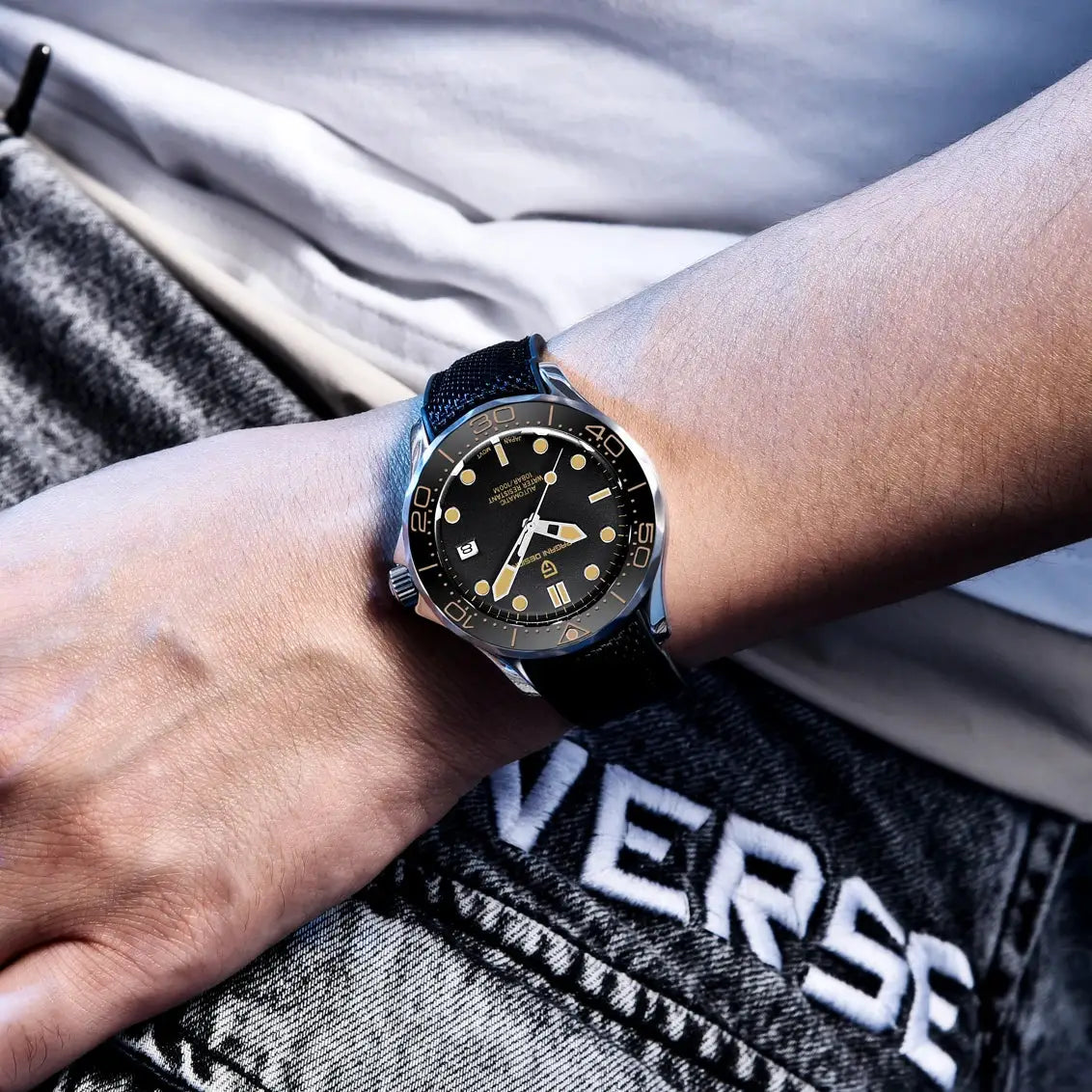 PAGANI DESIGN men's luxury automatic watch with black dial, silver case and black fabric strap.