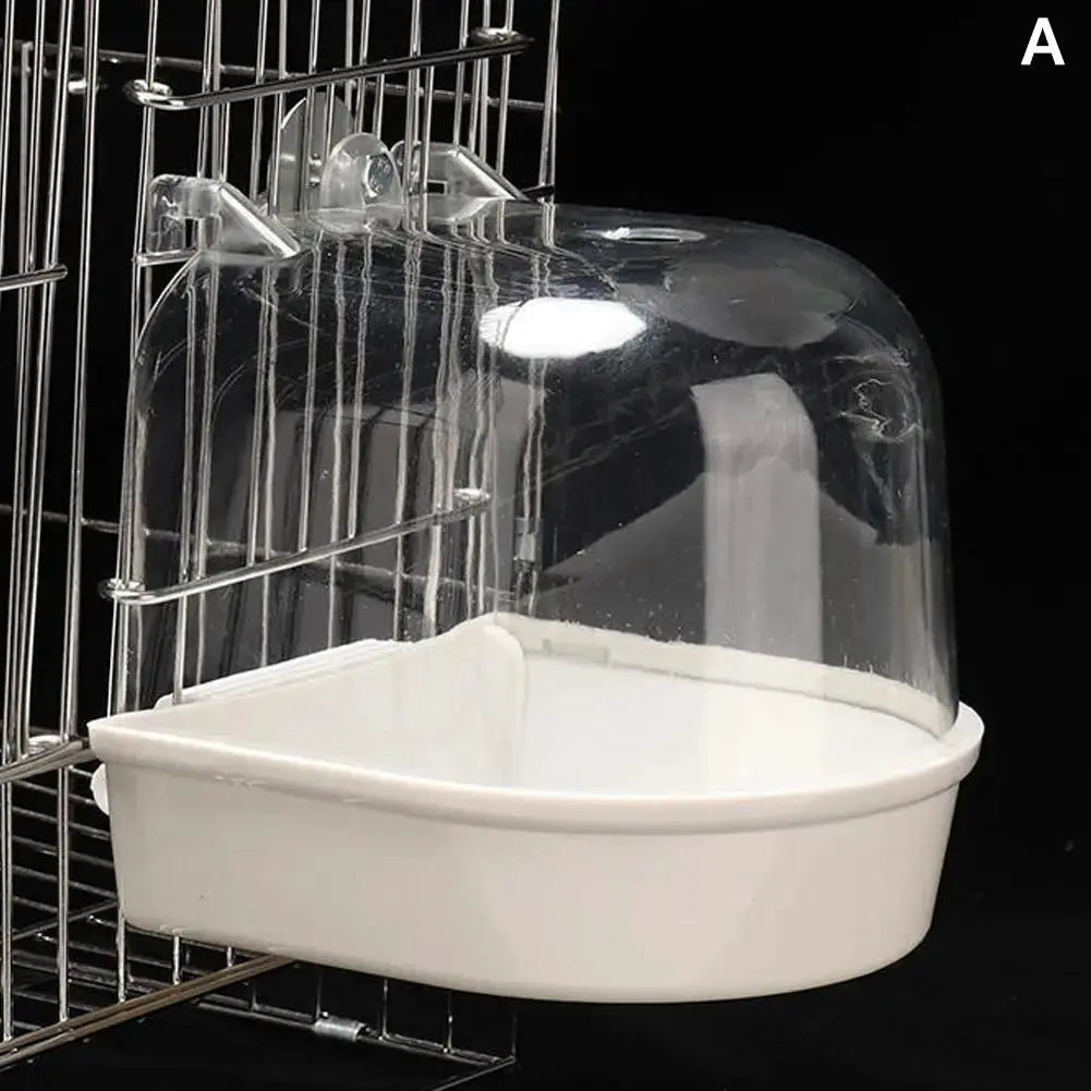 Hanging bird bath cube with white plastic tub and clear dome for small birds in cages.