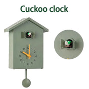 Simples Market cuckoo wall clock, 20x25cm gray-green case with orange hands and bird cuckoo.