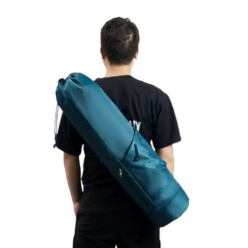 Large-capacity yoga mat bag with adjustable shoulder strap in teal blue; waterproof and breathable