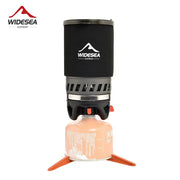 Widesea camping cooking system with heat exchanger gas stove burner atop orange tripod and pink propane canister