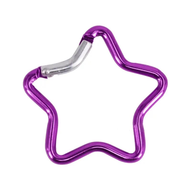Star-shaped purple aluminum alloy carabiner clip for keychains with a spring-loaded gate, ideal for hiking and travel