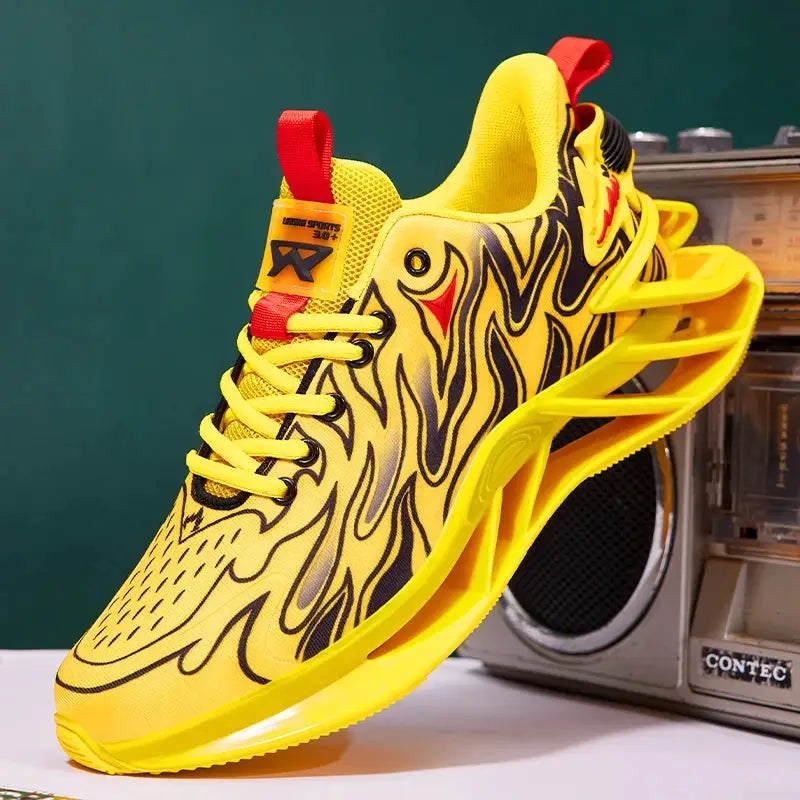 Men's yellow running sneaker with black flame pattern, red pull tab, sculpted sole