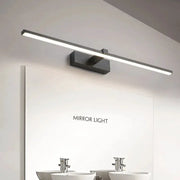LED mirror light wall lamp in black with a long horizontal LED strip above a bathroom mirror