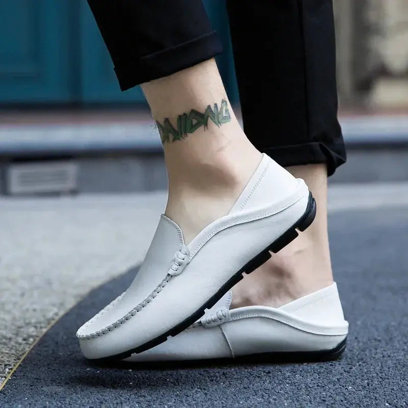 Men's slip-on white genuine leather loafers with moccasin stitching and black sole