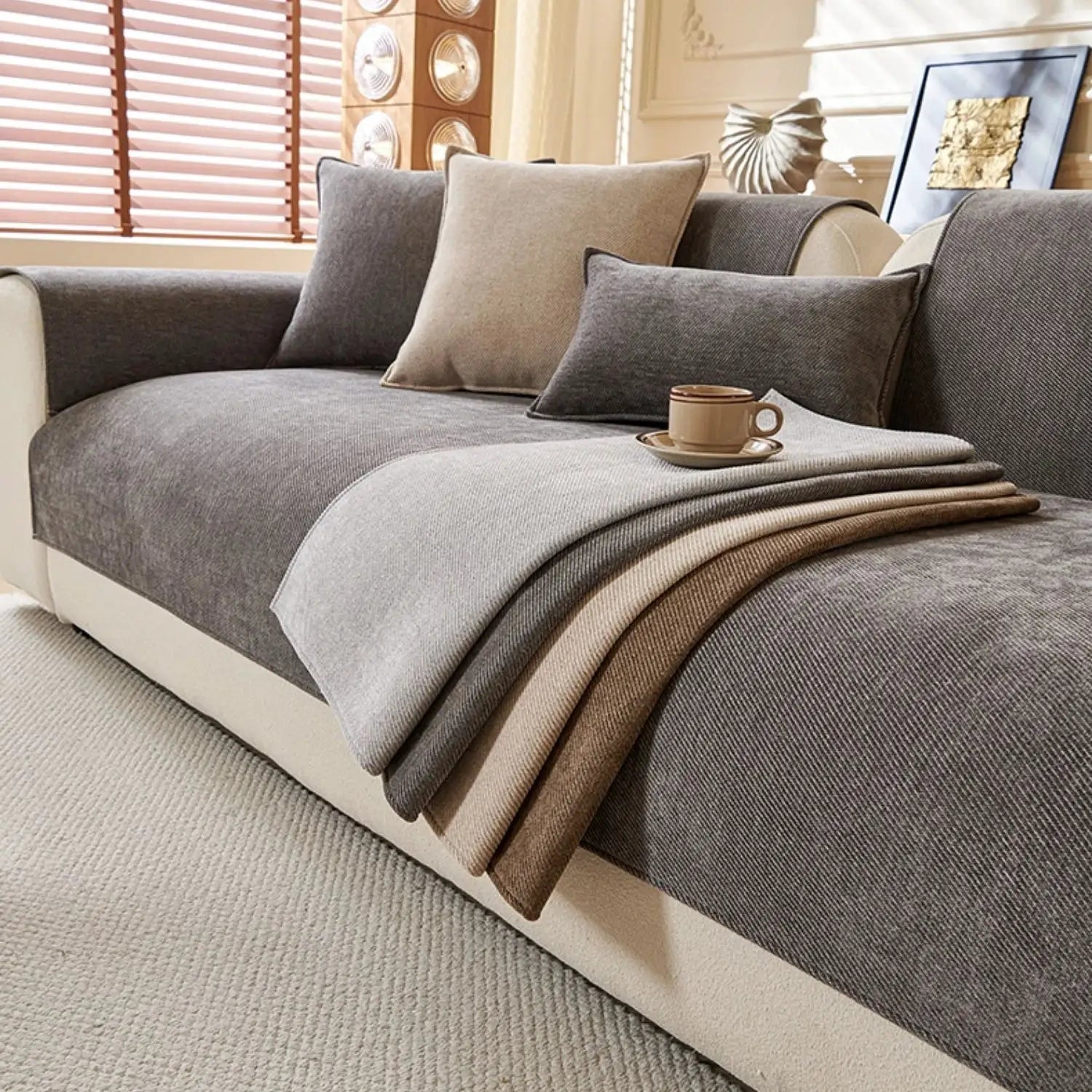 Minimalist twill chenille anti-slip sofa cover by Simples Market on gray couch with beige cushions