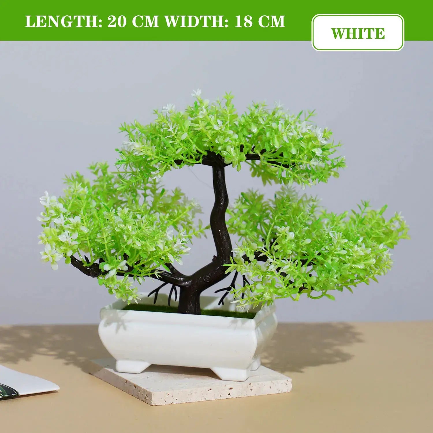 Artificial bonsai small tree in white ceramic pot with lush green leaves for tabletop decor.
