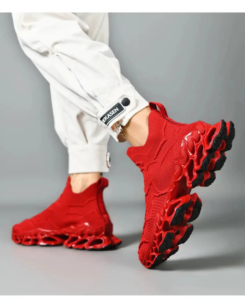 Men's red knit sneakers with a sculpted red and black outsole, casual running shoes