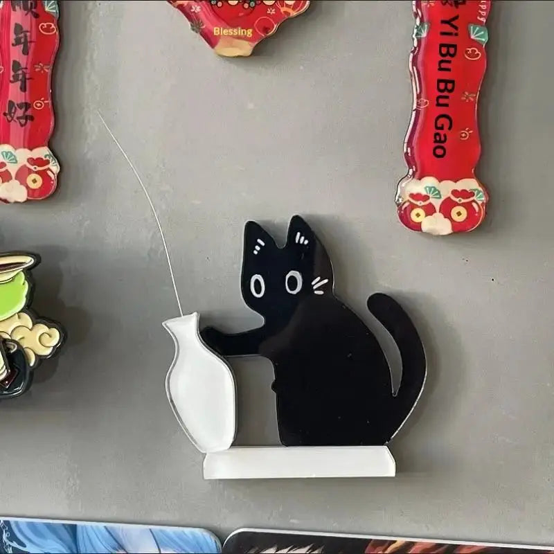 Refrigerator magnet: black cat pushing a white vase on a white pedestal, Cat Whisker Collection decor